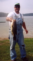 Dave Hornberger and a 4 lb. 4 oz. Smallmouth Bass (08/03).