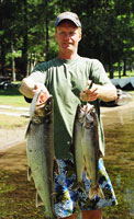 Glenn Macdonald with 12 lb, 5 lb and 3 lb Lake Trout. (07/05 on Desert Lake)